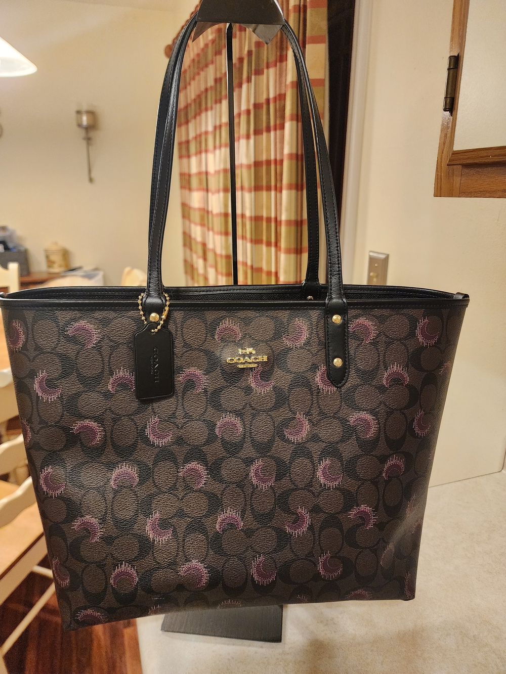 Coach Reversible City Tote in the brown and purple moon print